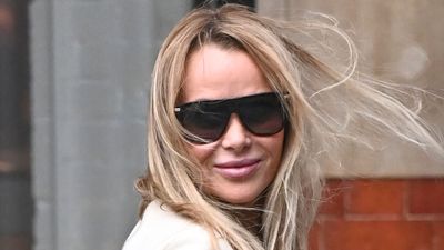 Amanda Holden is a vision in a cosy white jumper dress and gorgeous matching boots