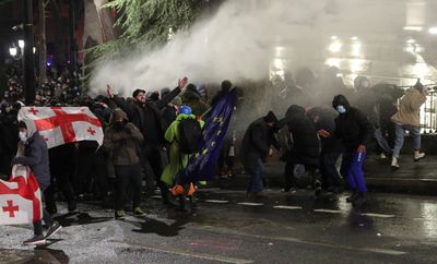 Georgia protesters rally for second night after PM suspends EU talks