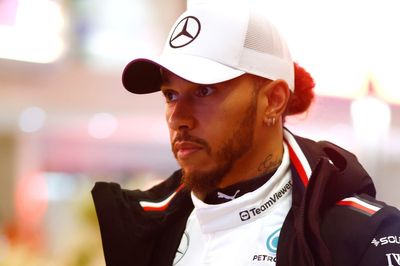 Hamilton in “two minds” over Ferrari run at Abu Dhabi test