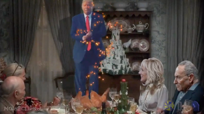 Trump posts bizarre ‘Christmas Vacation’ parody video of Biden and Harris – and himself leaping out of a Thanksgiving turkey