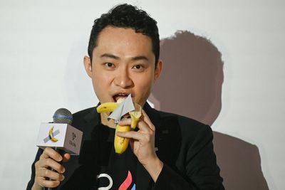 Crypto-tycoon who bought infamous banana artwork for $6.2million eats fruit in bizarre stunt