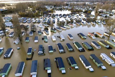 Residents at flooded waterside parks urged to stay away from their homes