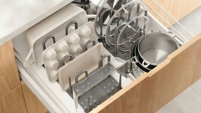 A discounted Umbra peg board organizer streamlined my messy pots and pans cabinet – now my kitchen is tidier than ever