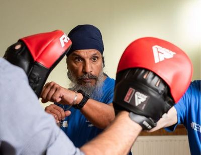 'Everyone is smiling': A day at London's boxing club for people with Parkinson's