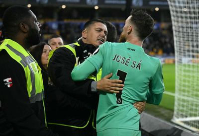 Jose Sa jumps into crowd to confront a Wolves fan at Molineux