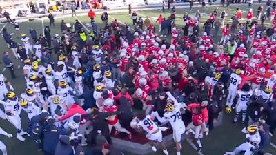 Ohio State-Michigan Ends in Brawl After Wolverines Plant Flag on OSU Logo to Celebrate Win