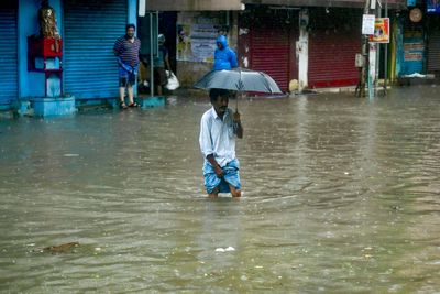 India: Rescuers brave waist-high water as Cyclone Fengal delivers record rainfall to Puducherry