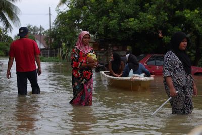 At least 13 people dead as Thailand and Malaysia face worst floods in decades