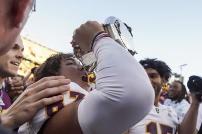 College Football Players Plant Flags In Rival Stadiums