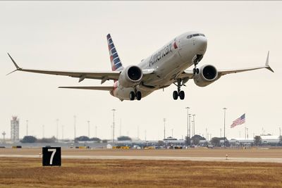 American Airlines Passenger Charged After Attempting to Exit Plane Midflight and Assaulting Staff