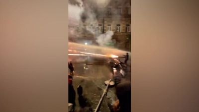 Protester shoots ‘fireworks gun’ at riot police during pro-EU protests in Georgia