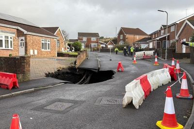 Residents told to avoid area after large sinkhole appears on housing estate
