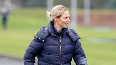 Zara Tindall braves winter chill looking cool and cosy in coveted adidas trainers and duvet-style coat