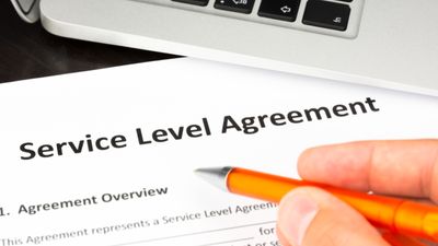 What is a Service Level Agreement (SLA) in web hosting?