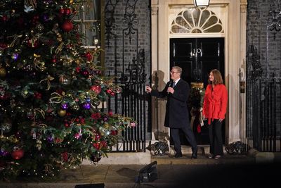 Prime minister Keir Starmer switches on Christmas lights outside 10 Downing Street