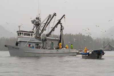 Empty survival suits found but no signs of life after fishing boat overturns in Alaska storm