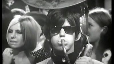 "We've got a new lot from Leighton Buzzard who're going to do their best for you." Keith Richards playing tuba on Sonny and Cher's I Got You Babe while The Rolling Stones' manager professes his love for Mick Jagger is peak '60s TV