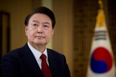 South Korea's President Urged To Drop Martial Law Plans