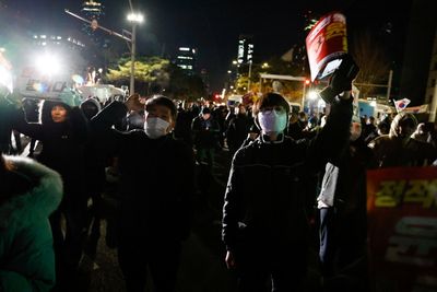 South Korea’s President Yoon says he will lift martial law