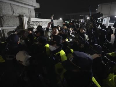 Police Guard National Assembly Amid Protests Over Martial Law Declaration