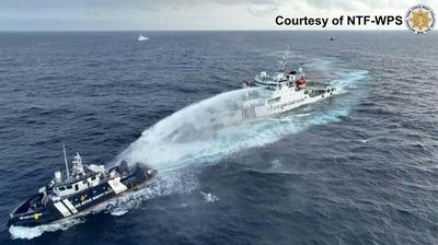 Philippines Says China Coast Guard Fired Water Cannon, 'Sideswiped' Govt Vessel