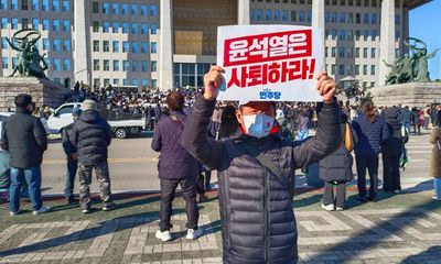 ‘Democracy isn’t supposed to work like this’: disbelief in Seoul in wake of martial law upheaval