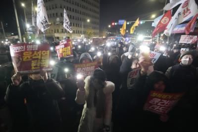 Protesters In Seoul Demand President Yoon's Resignation After Martial Law