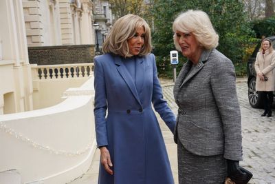 Recovering Queen embraces France’s first lady at literary award ceremony