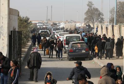 Syria gov’t forces battle opposition fighters near city of Hama