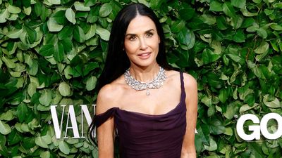 Demi Moore's midnight plum gown with delicate off-the-shoulder detail and plenty of diamonds is mesmerising