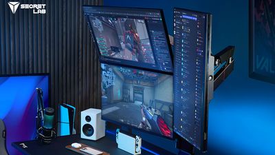 The company that probably made your chair now makes a ridiculous monitor arm to mount up to FOUR 32-inch screens