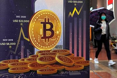 Bitcoin passes $100,000 for first time in massive crypto rally