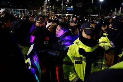 South Korean MP describes scaling walls of parliament to vote down martial law