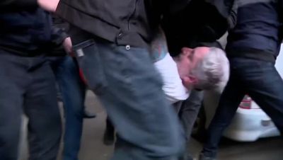 Georgian opposition leader dragged from HQ into police car