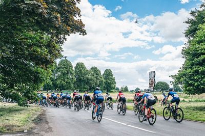 Riders on elite women’s race team allege sexual harassment from banned youth coach after past police warnings and safeguarding concerns raised with British Cycling