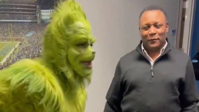 The Grinch Showed Up in Detroit for 'Thursday Night Football' and Met Barry Sanders