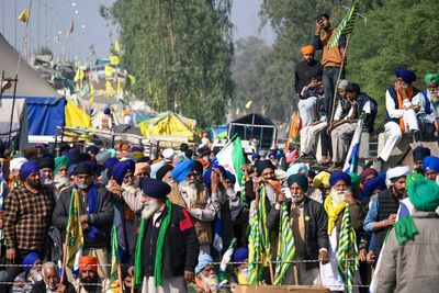 Farmers clash with police near Delhi as protests over crop prices escalate