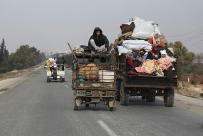 Thousands flee Syria’s Homs as opposition forces advance on key city