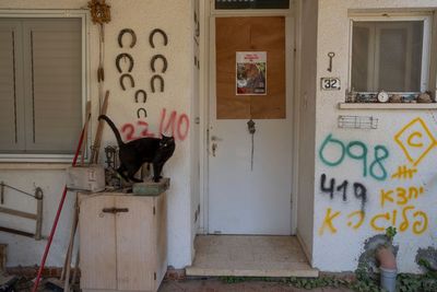 AP PHOTOS: After 15 months of abandonment, hostage homes are empty memorials