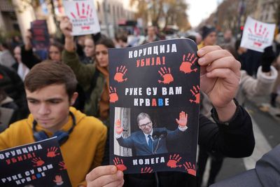 Car rams and injures orchestral musicians in Belgrade during a protest over station roof collapse