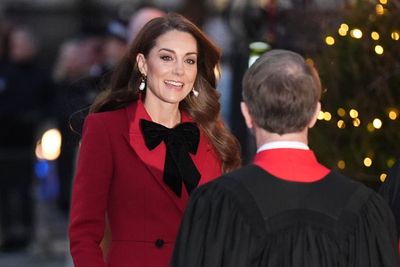 Kate sports festive bow ensemble at Christmas carol service