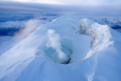 Earthquakes under a volcano near Alaska's largest city raise concerns