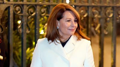 Carole Middleton oozes elegance in a black lace dress and stunning white coat at Princess Catherine's annual carol concert