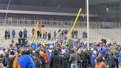 Boise State Students Carry Goal Post Into River in Frigid Cold After Conference Title