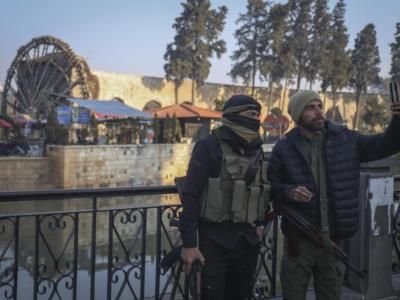 Syrian Protesters Topple Statue Of Hafez Al-Assad