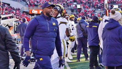 Michigan's Sherrone Moore Trolls Ohio State With Flag-Planting Gesture at Hoops Game