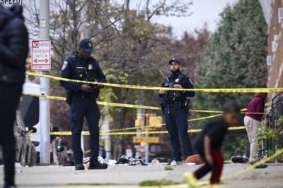 Police Officer Crashes Motorcycle Into Crowd At Christmas Parade