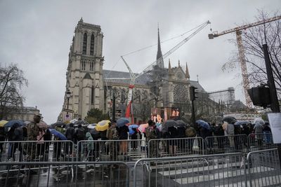 Notre Dame's reopening celebrated its saviors as much as the cathedral's resurrection from fire