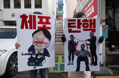 Travel ban on South Korea’s Yoon amid investigation into his martial law decree