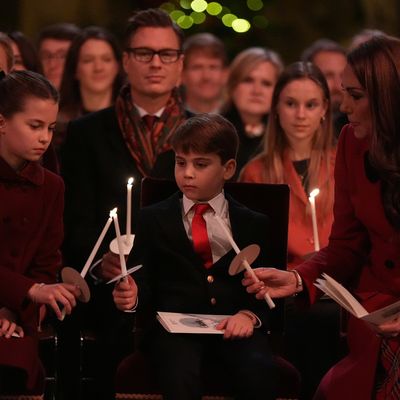 Fans Demand to Know the Identity of Dashing "Clark Kent" Royal Seated Behind Princess Kate at Her Carol Concert